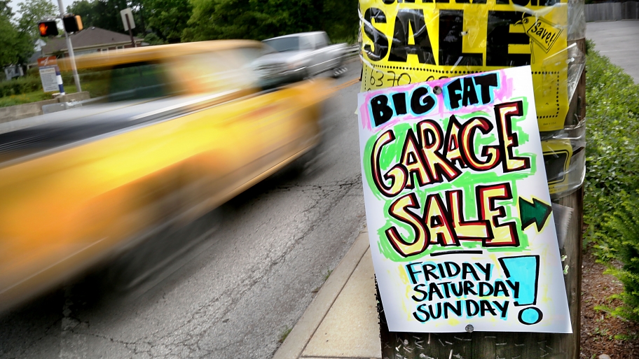 Garage sale signs on a telephone pole